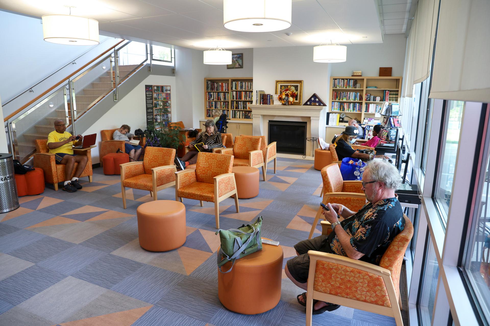 Group of diverse senior residents enjoying library services at the Lexington Senior Center.