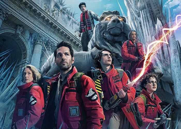 Art for the Ghostbusters Frozen Empire movie featuring a group of people in suits with ghost fighting gear